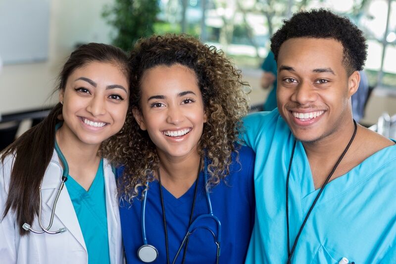 Group of medical students smiles for the camera