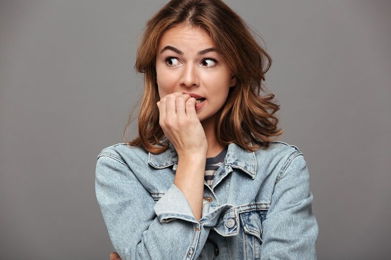 Close,Up,Portrait,Of,A,Worried,Teenage,Girl,In,Denim