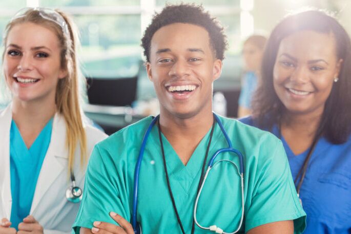 Cheerful diverse group of vocational nursing students vocational nurse student