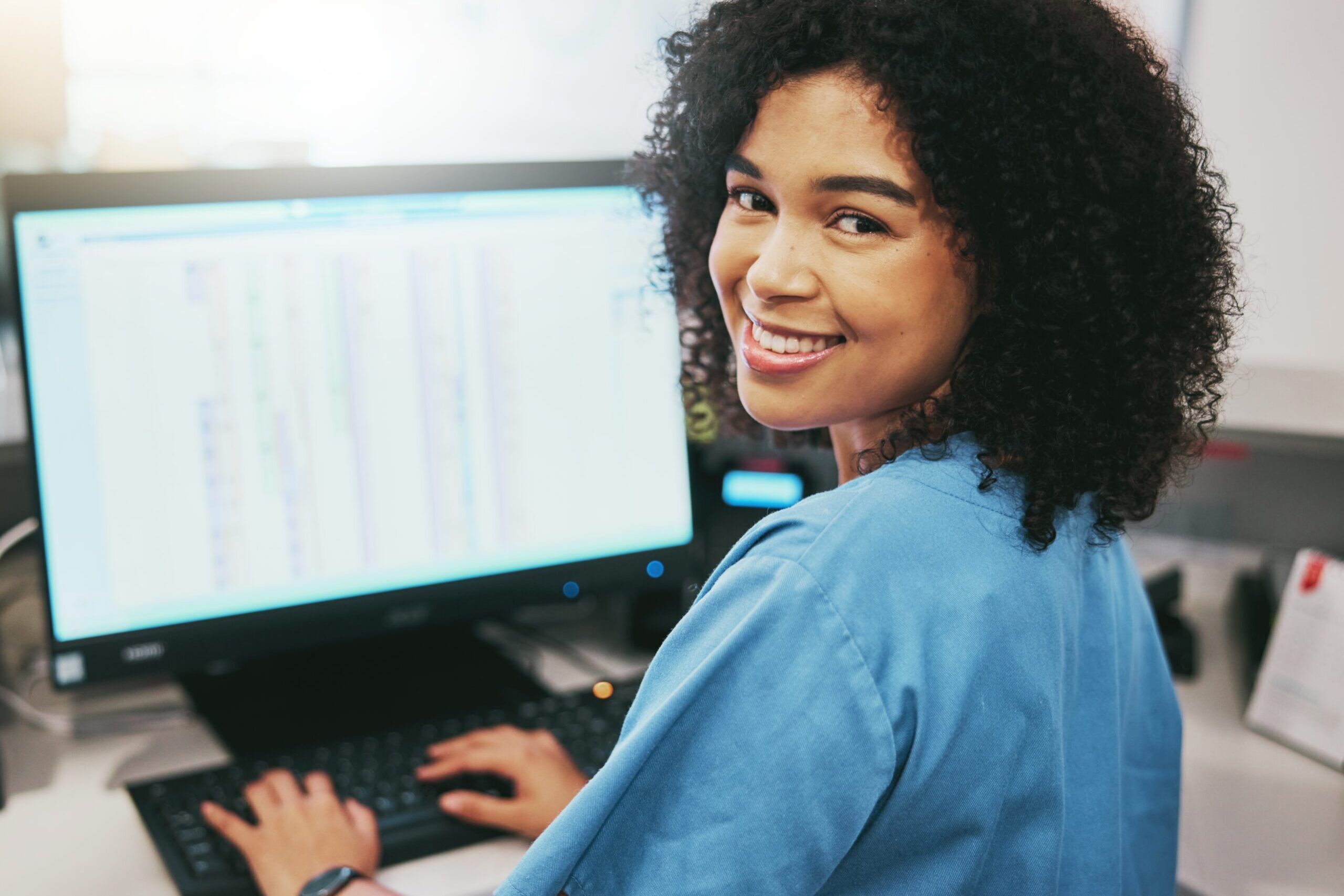 Portrait,,Nurse,And,Receptionist,At,Hospital,On,A,Computer,Working
